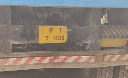 Heavy vehicles being driven with obscured license plates to avoid fines