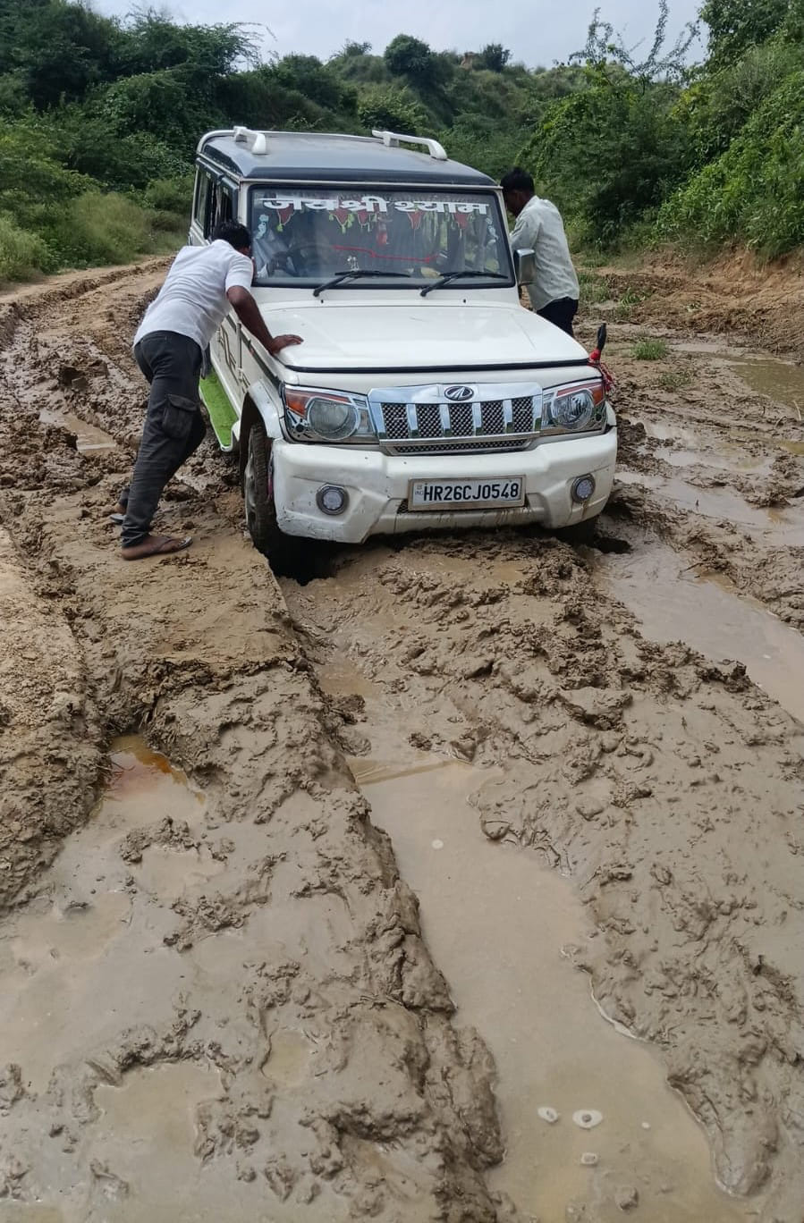 Vehicle stuck in marsh for an hour and a half; patient's life in jeopardy.