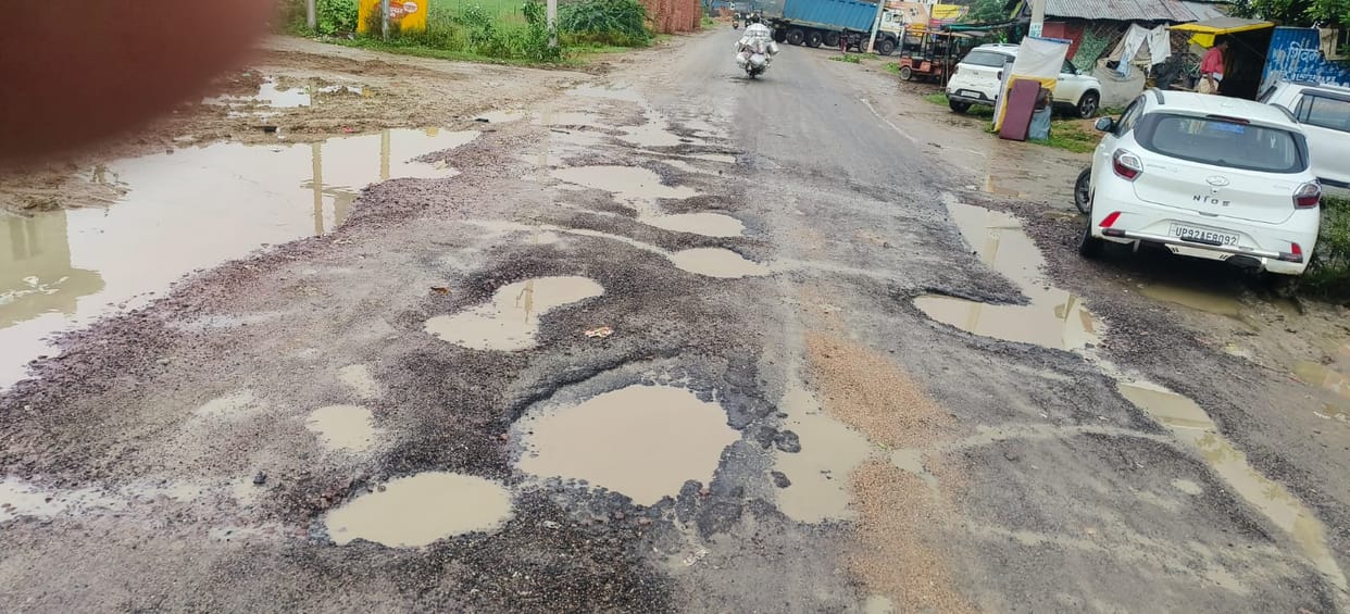 Hundreds of potholes on the roads; risk of accidents.