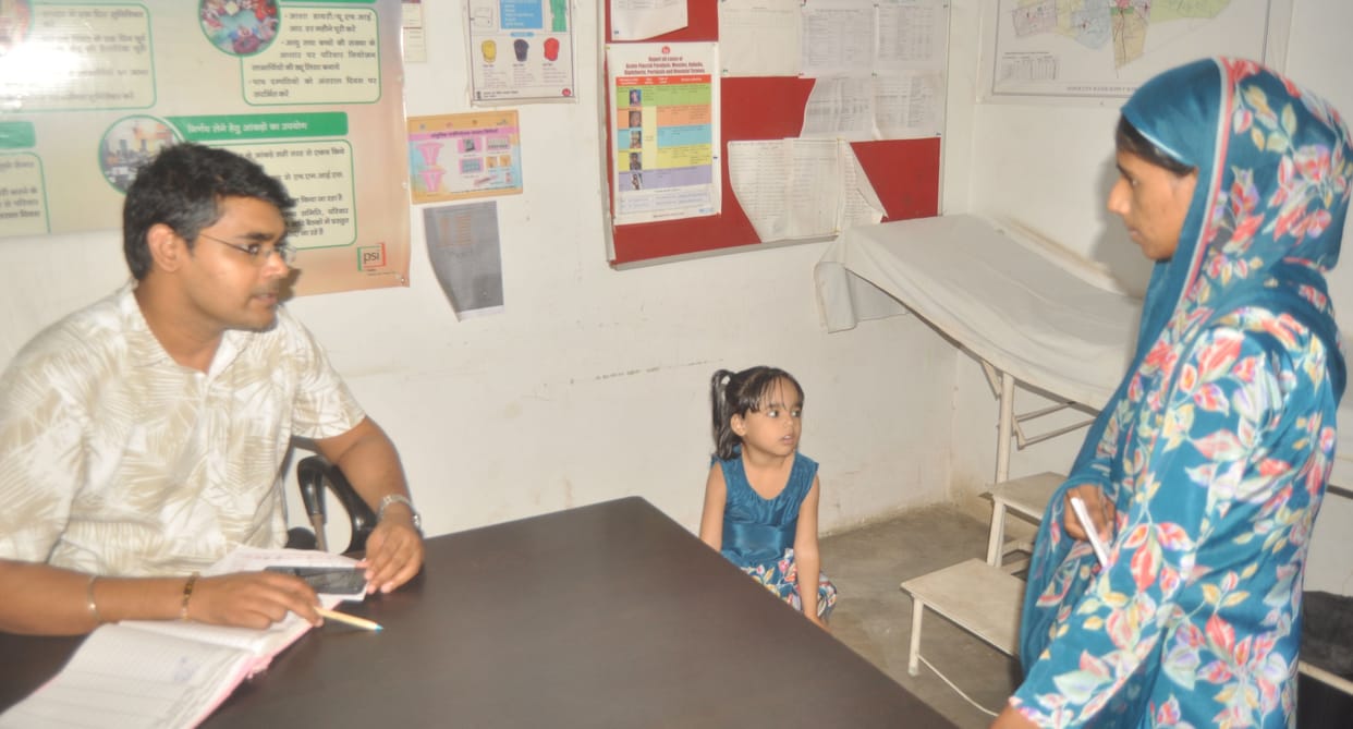 Patients gasping due to fever and cough arrive at Jan Arogya Melas.