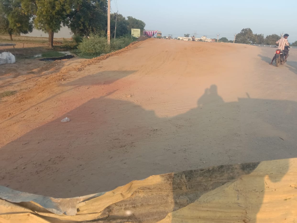 Service road higher than the main road, accident risk rises; villagers up in arms.