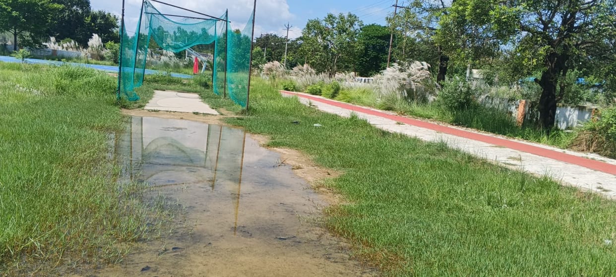 Waterlogging at the district stadium grounds halts practice for 400 students.
