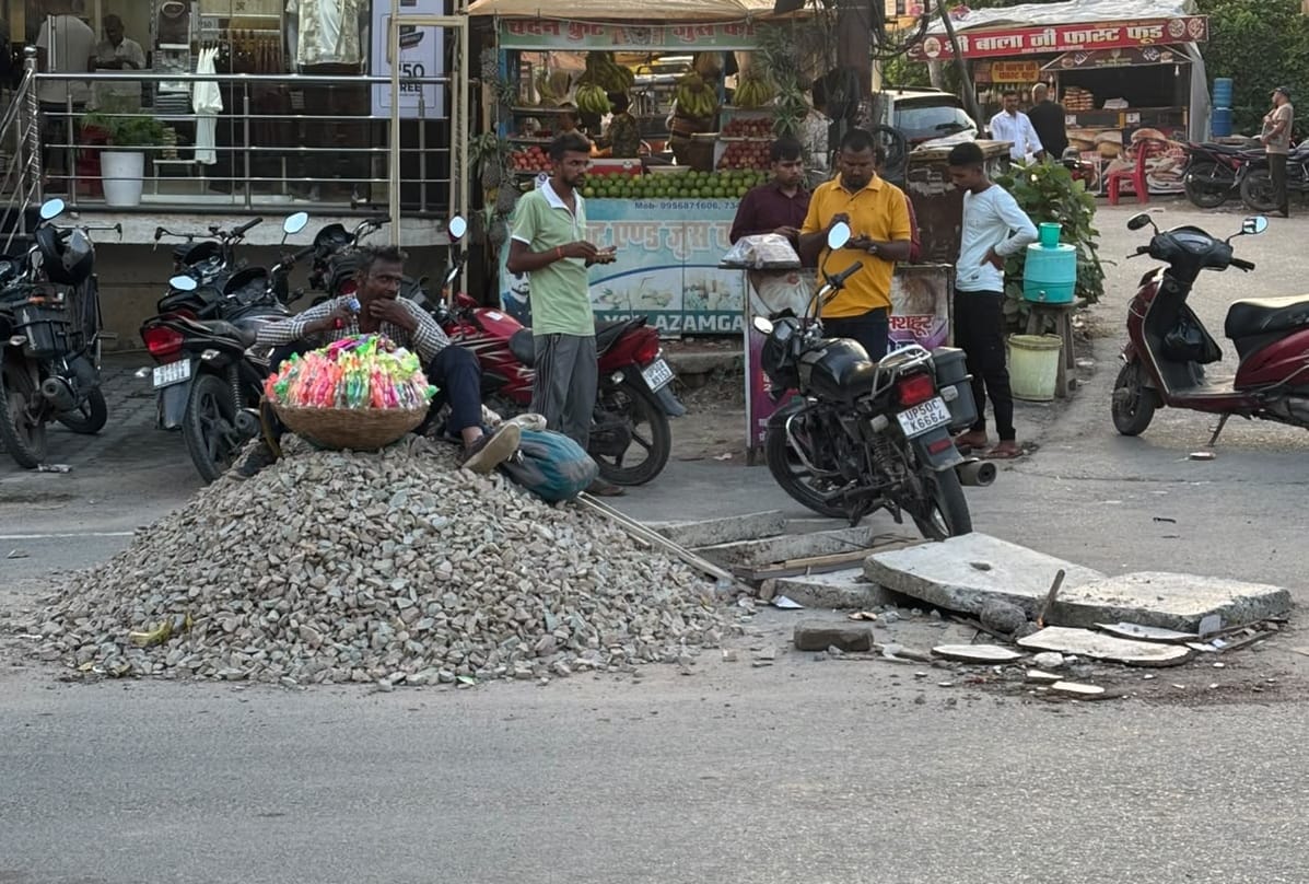 Two departments together could not fill two potholes in four days.