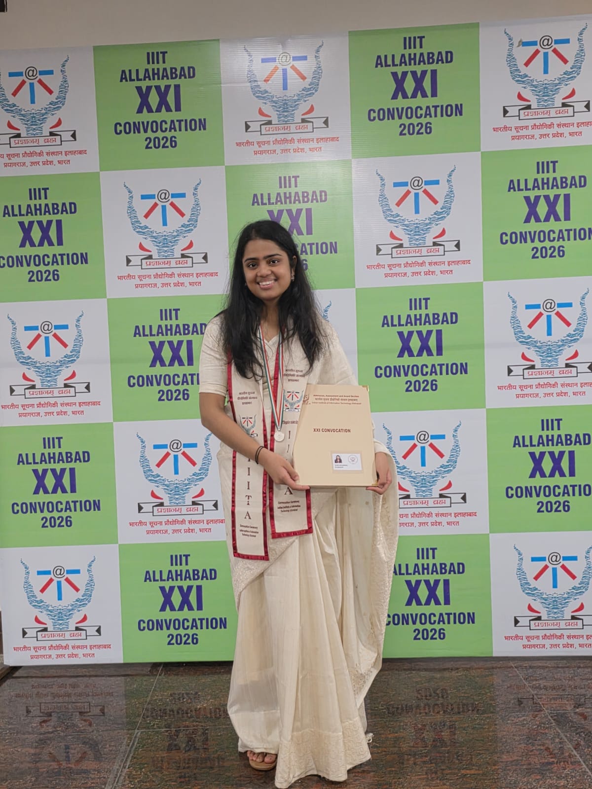 Farmer father prepared the land; daughter cultivated medals.