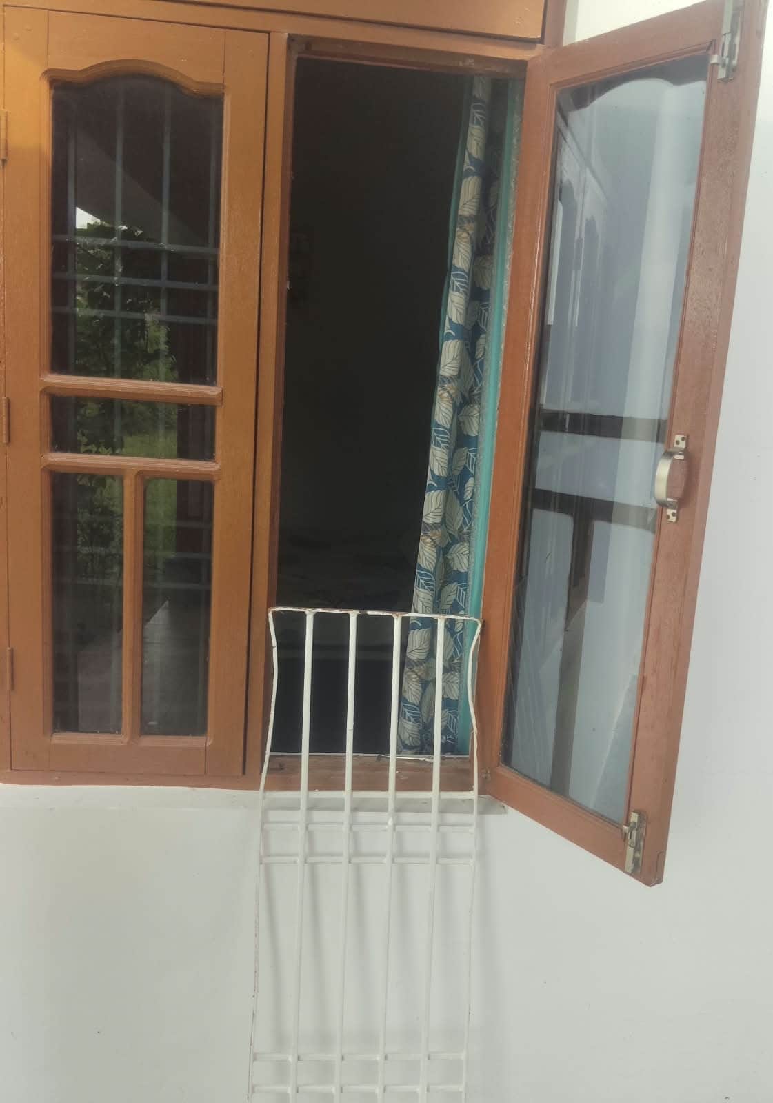 Thieves broke into the house by ripping out the window grille but fled when the family woke up.