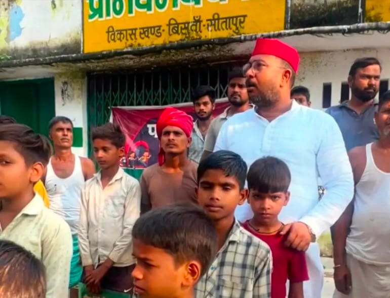Symbolic school set up in closed school; study kits distributed to children.