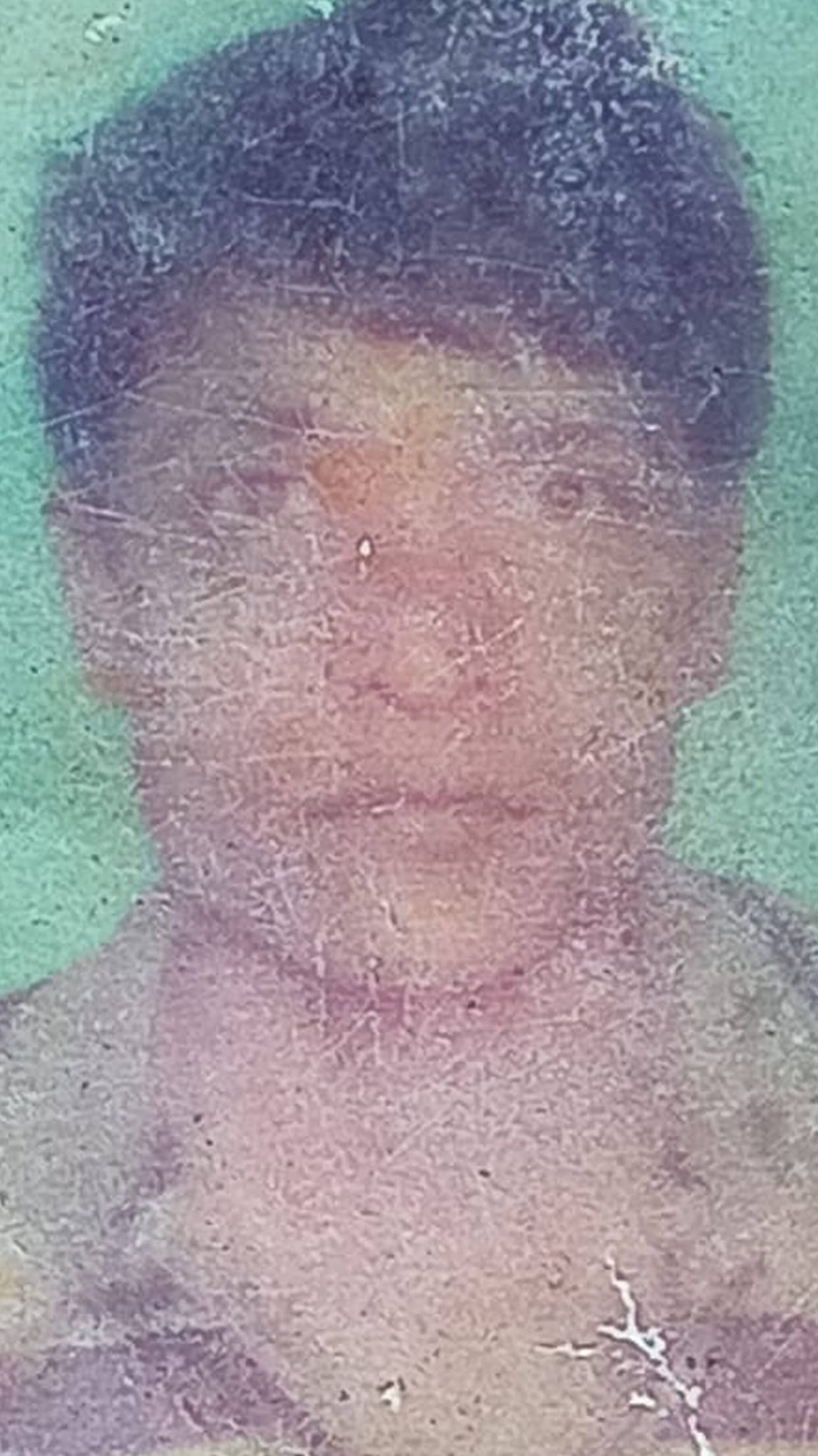 The body of a youth missing for three days was found in a pond in front of his house.