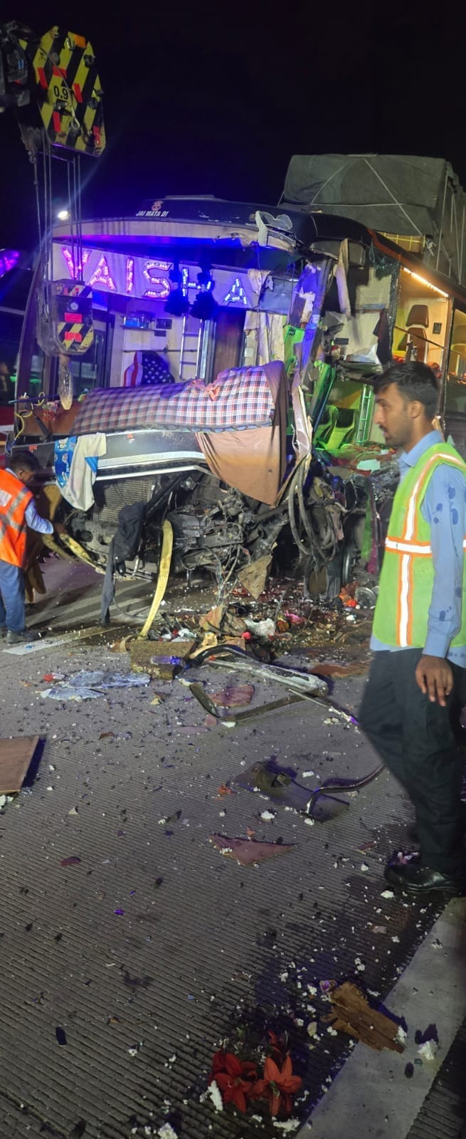 Sleeper bus collides with trailer; co-driver beheaded.