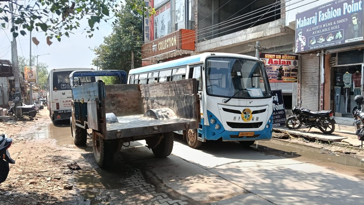 Traffic jam on Bhagwan Parshuram Chowk Road affects commuters and businesses.