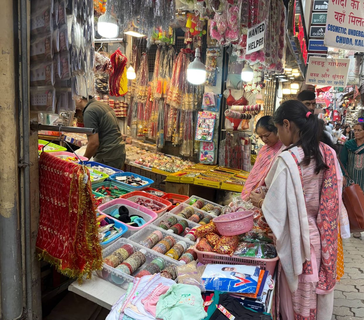 Festive fervor for Hartalika Teej and Ganesh Chaturthi; crowds throng the markets.