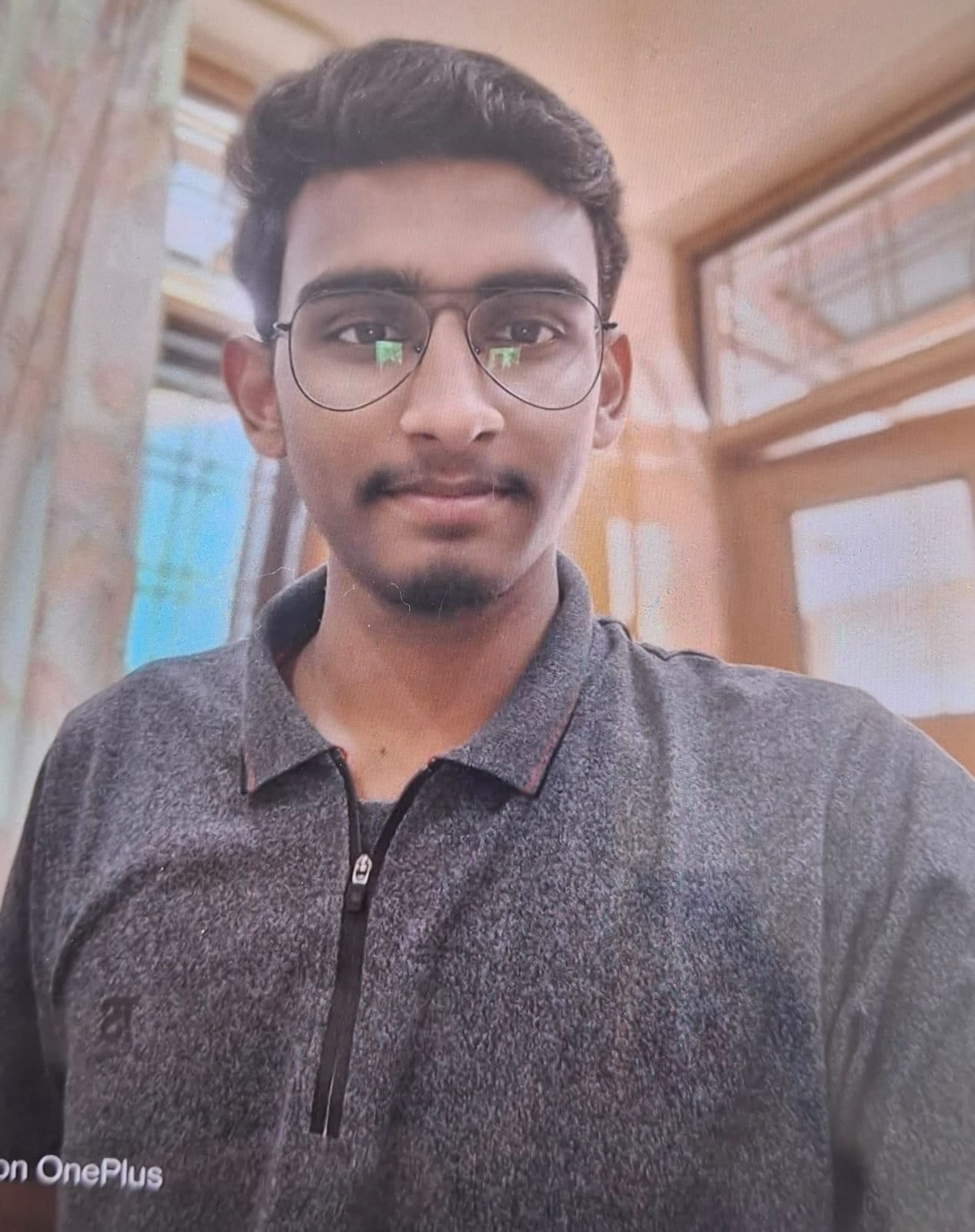 Scooter-borne youth dies after being hit by a vehicle; sister critically injured.