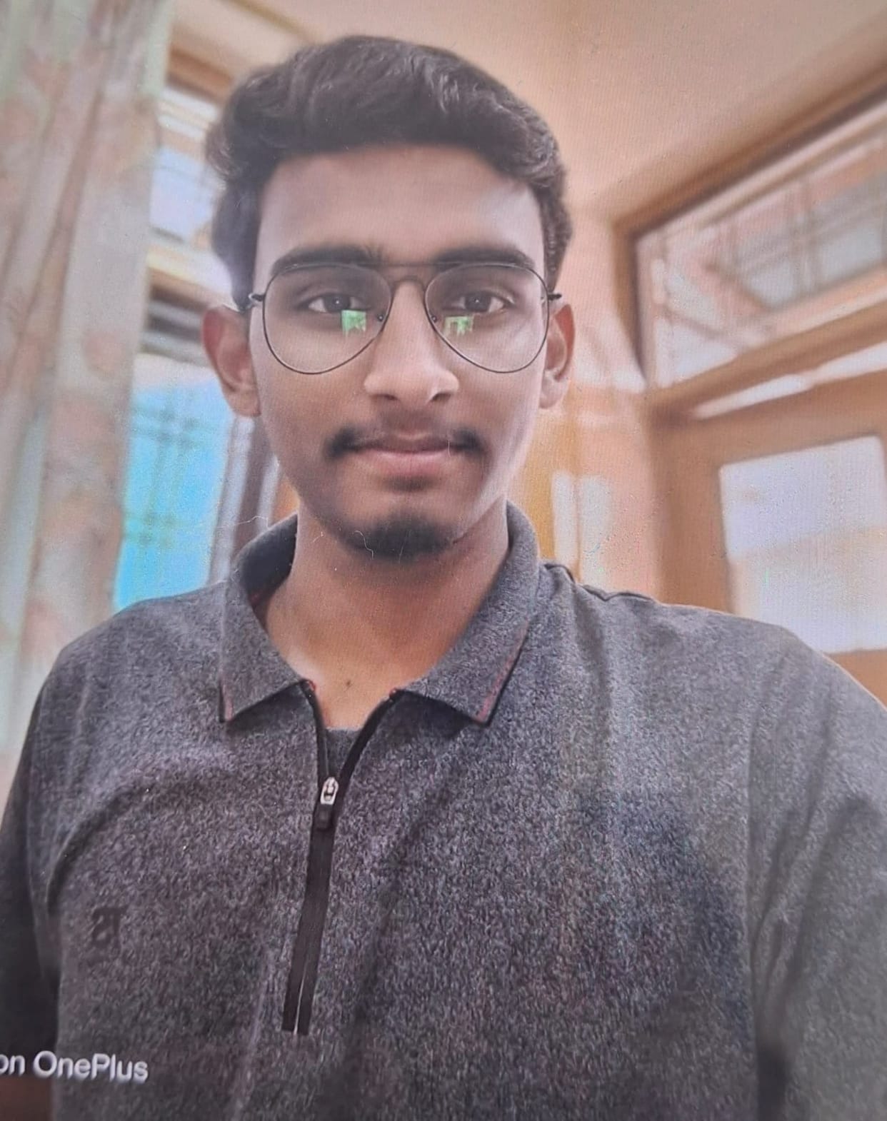 Scooter-borne youth dies after being hit by a vehicle; sister critically injured.