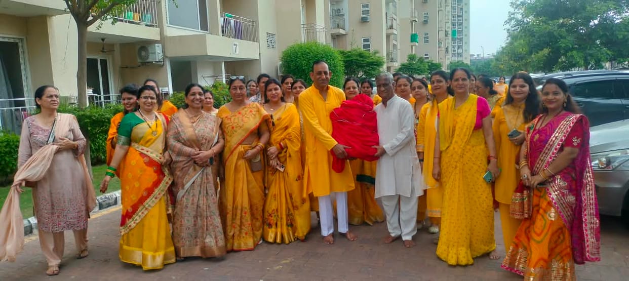 The city is decorated to welcome Bappa, and the procession is accompanied by drums and trumpets.