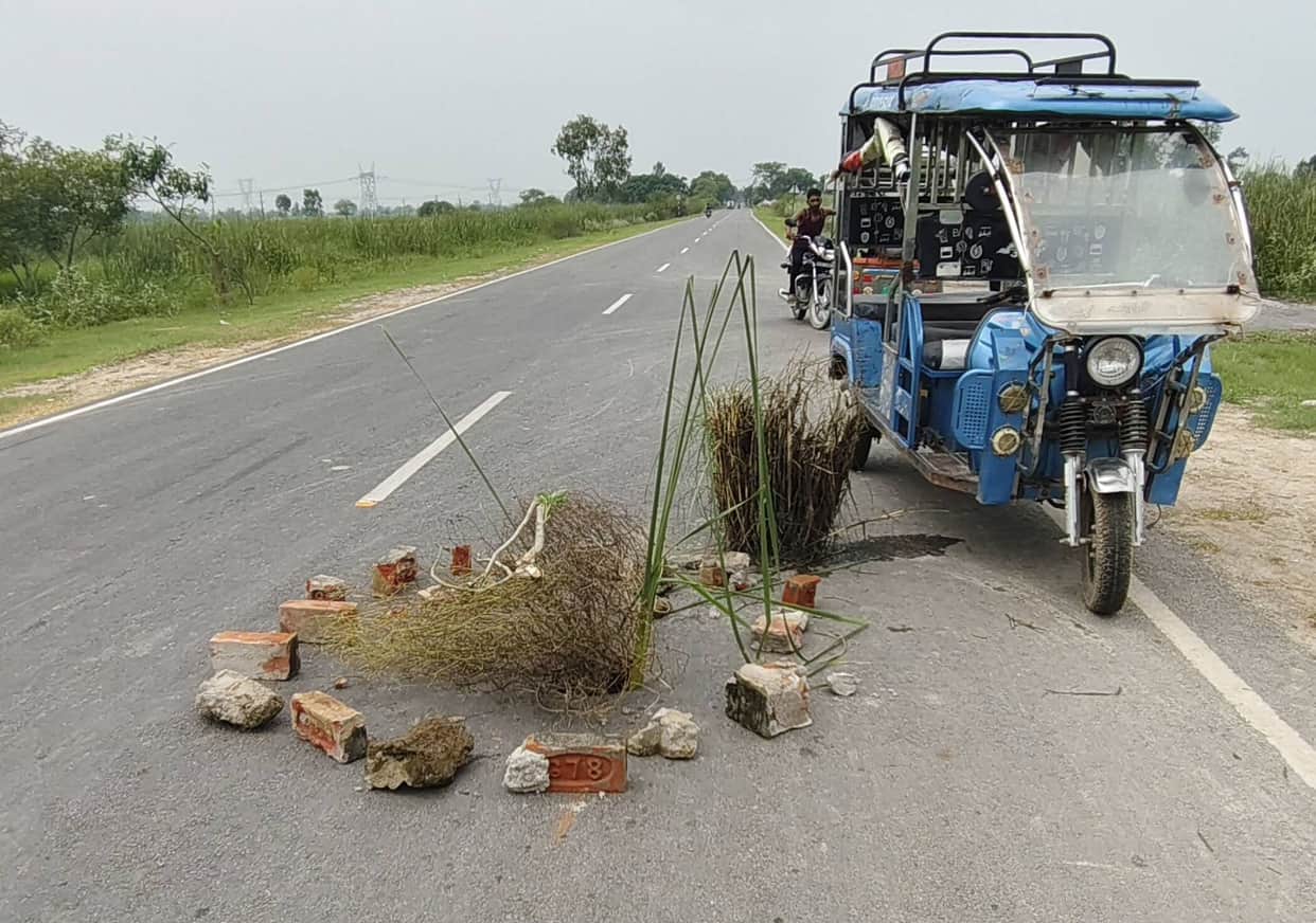 Road worth 89.6 crore caves in within five months; makeshift warning sign created using a bush.