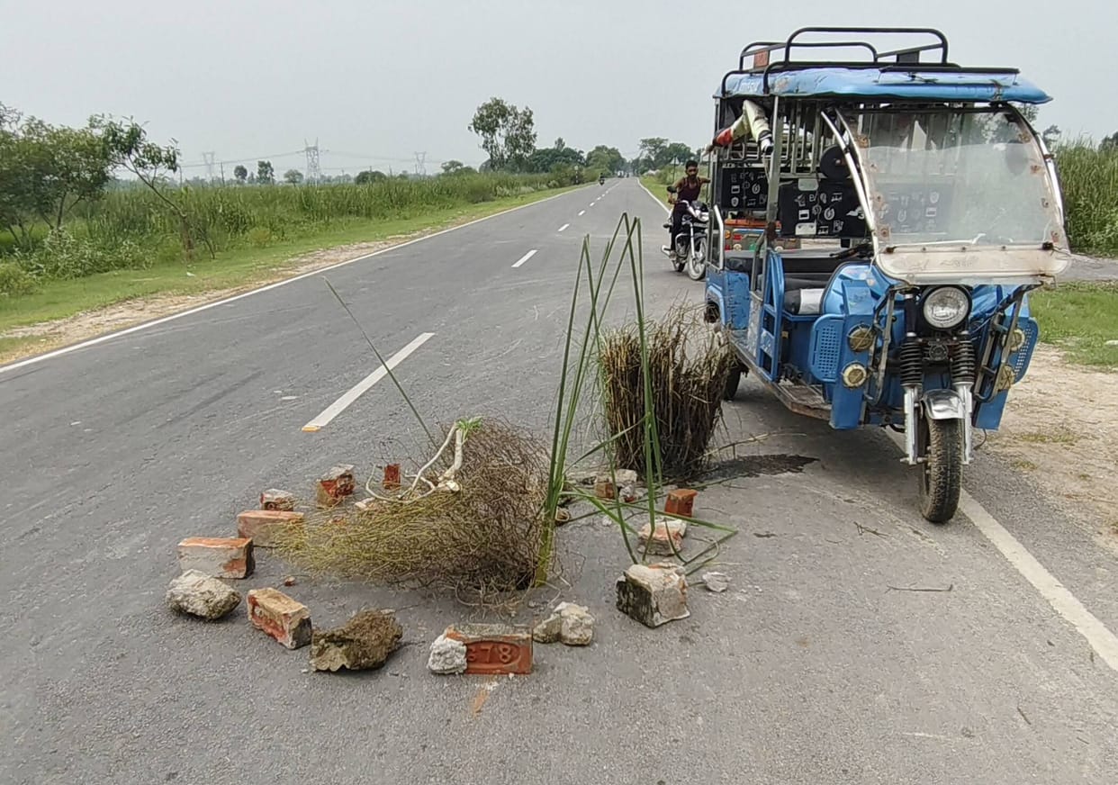 Road worth 89.6 crore caves in within five months; makeshift warning sign created using a bush.