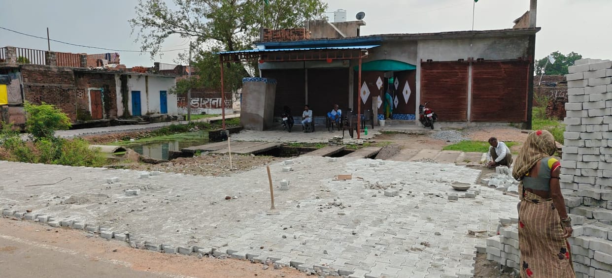 Questions raised over municipal interlocking work; construction extends to private property.
