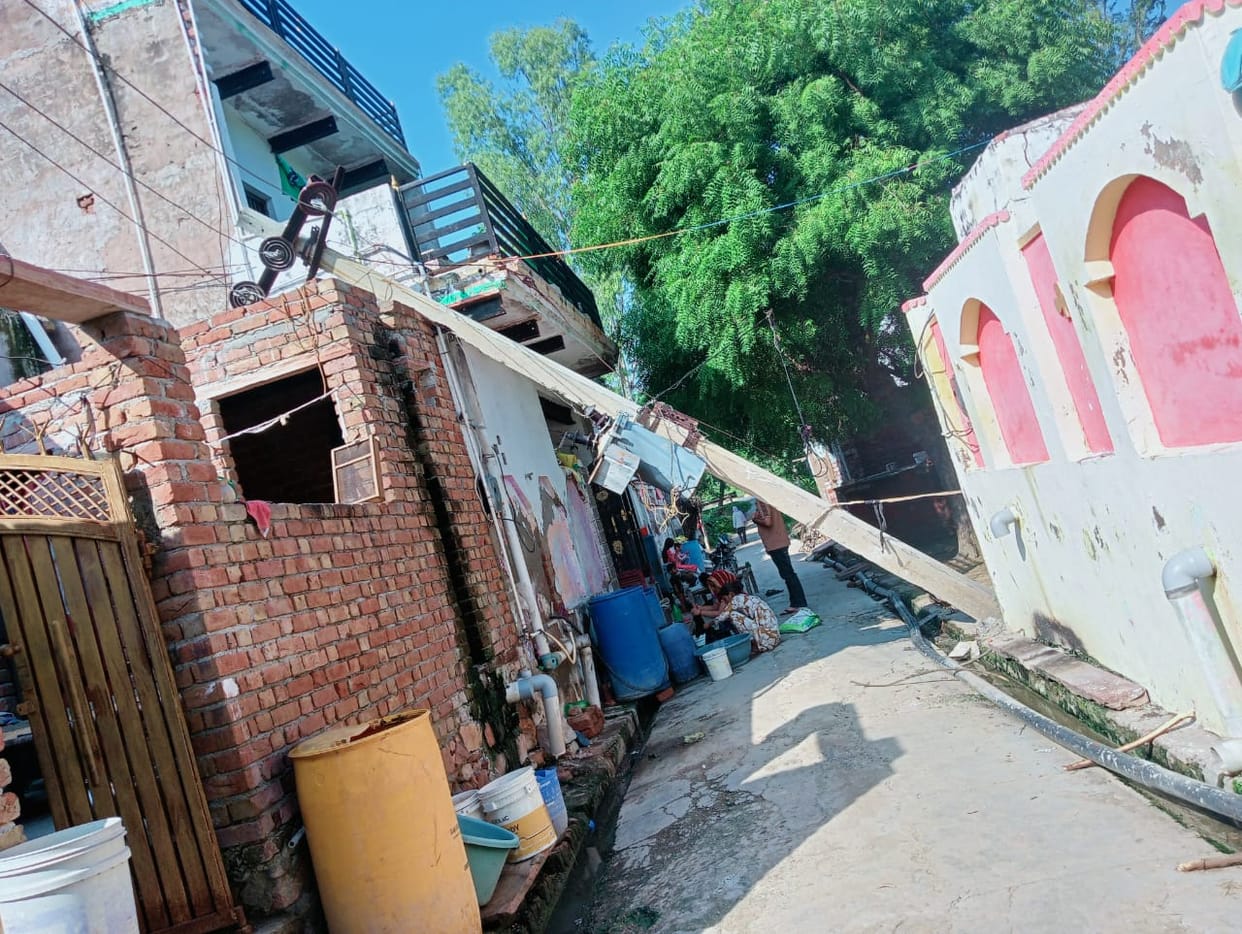Dilapidated electricity pole falls on house; villagers escape unhurt.