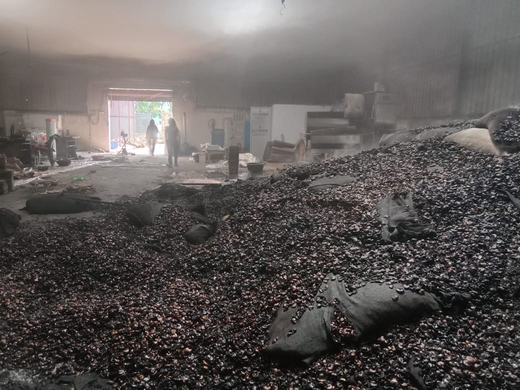 32 quintals of raw cashew nuts stored in 400 sacks were burnt in the fire.