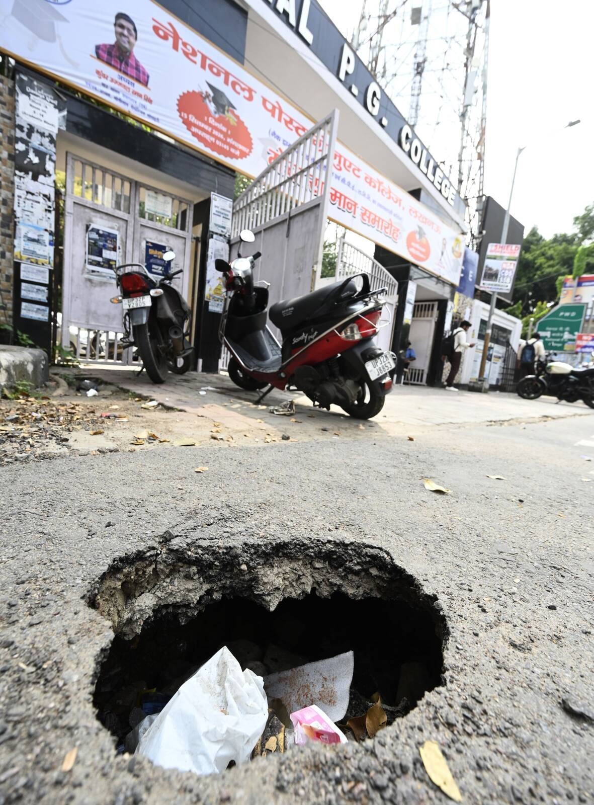 Road caves in opposite National PG College