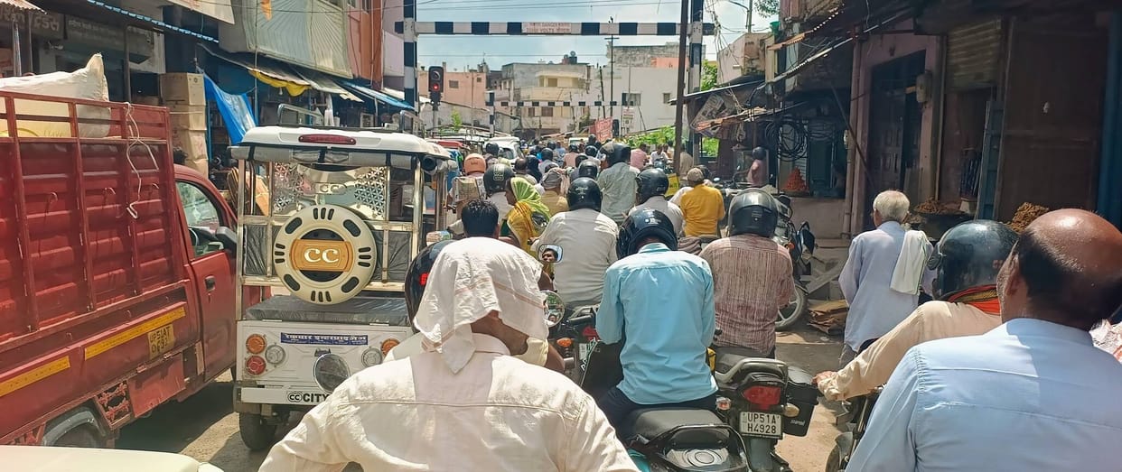 One crossing closed; long traffic jam at the other.