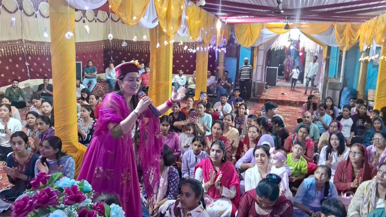 Devotees swayed to the music at the first *bhajan sandhya* of the Ganesh Mahotsav.
