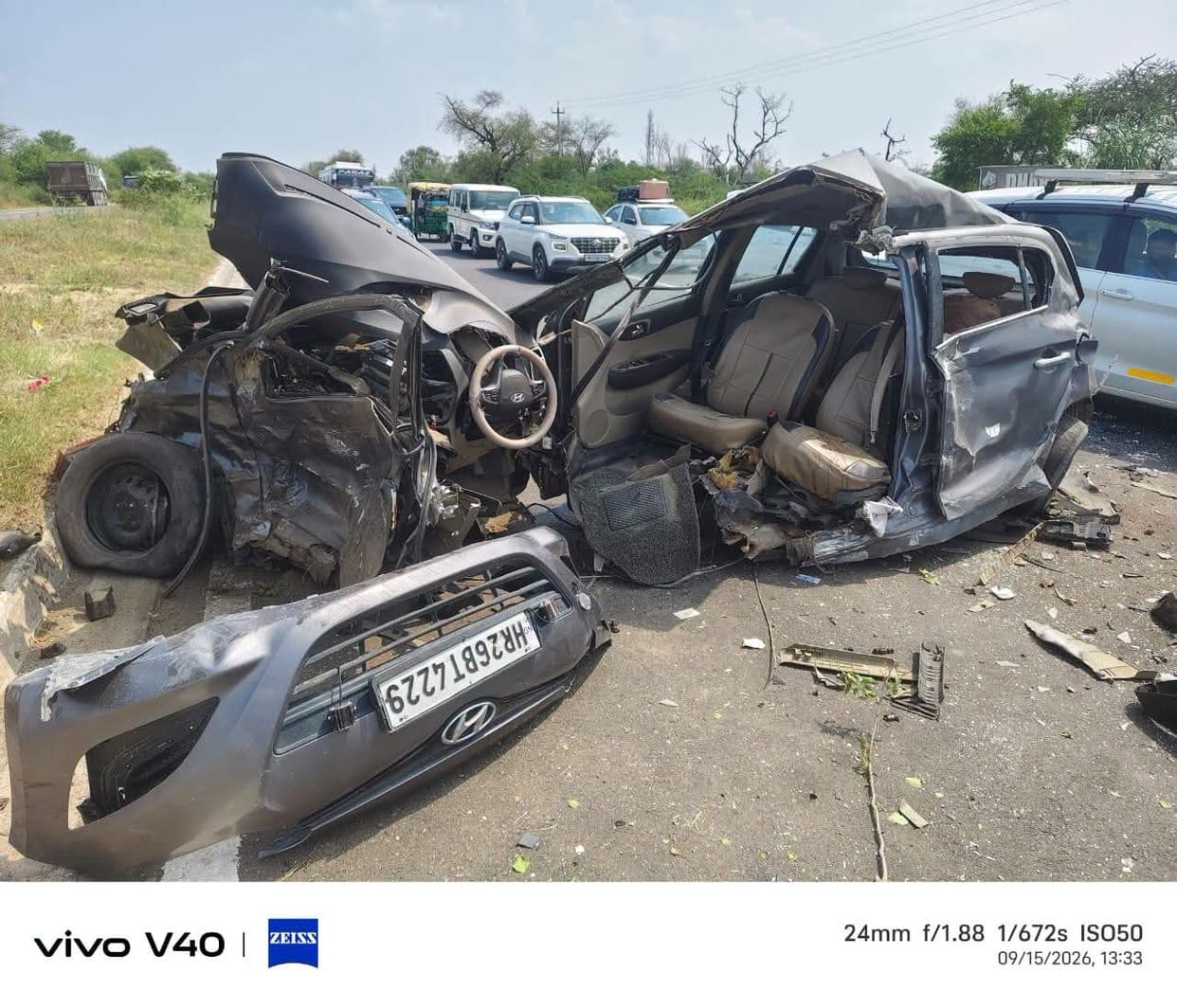 Tire burst, after crossing the divider, collided with another car, car split into two parts