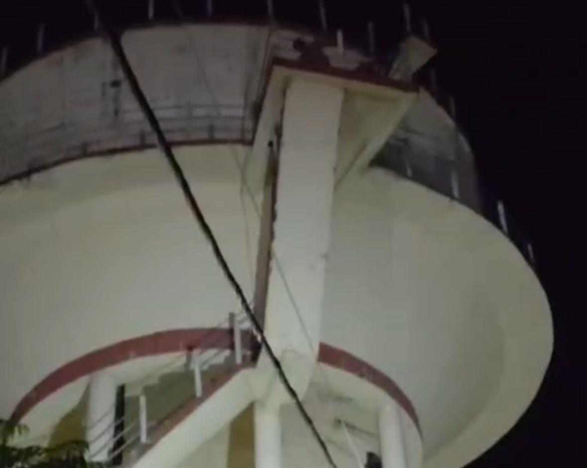 Young man climbs water tank after being scolded