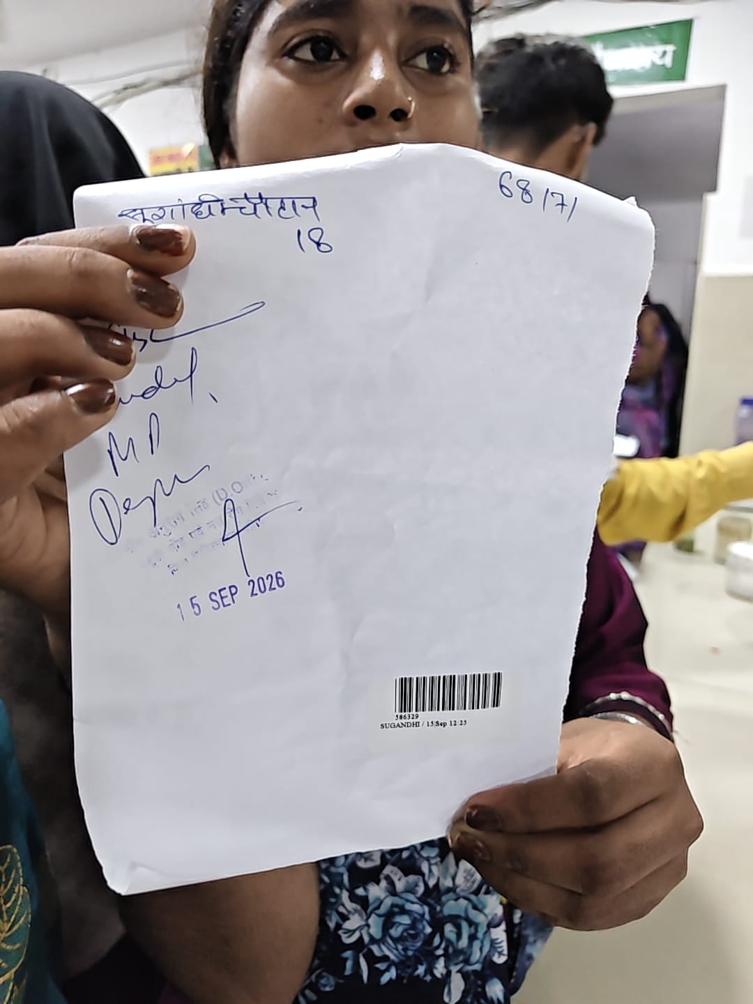 Crowd at the counter due to online appointment slip server failure; patients inconvenienced