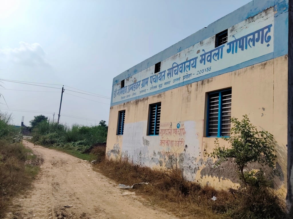 Residents waiting for a paved road