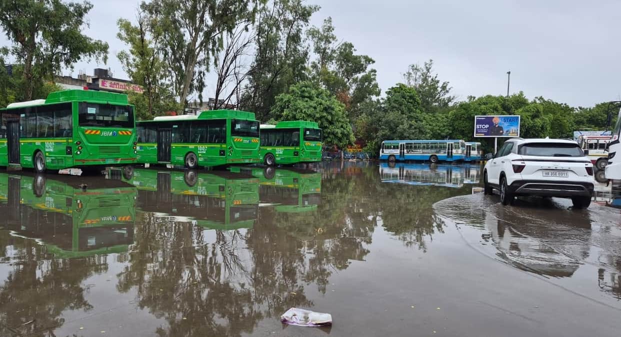 Pond-like conditions develop at the new bus stand as soon as it rains.
