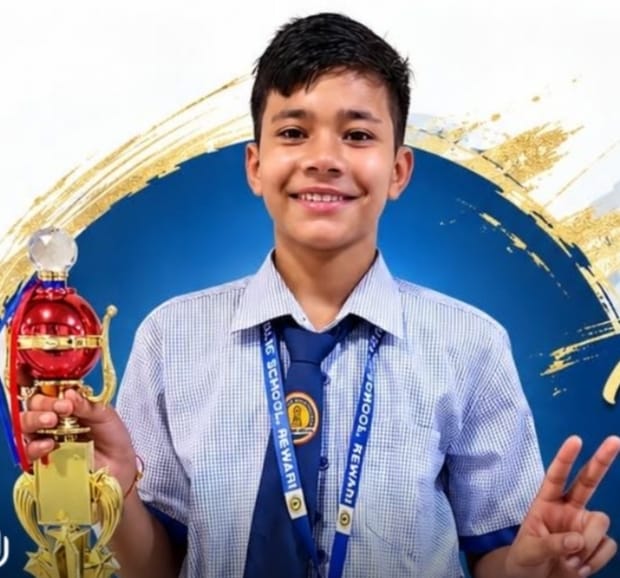 Nimish welcomed at school after returning with a silver medal in the table tennis competition.