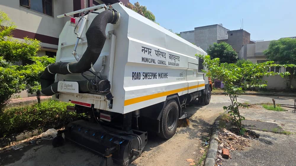 Road-sweeping machine stuck in registration hurdles