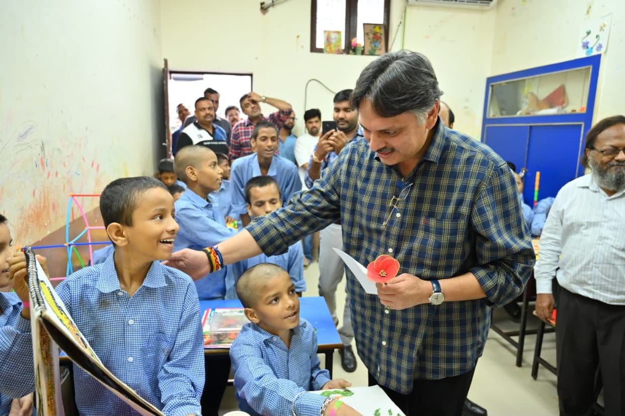 MLA Dr. Rajeshwar Singh visits special-needs children.