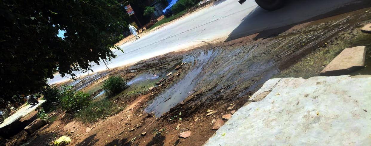 During the rainy season, water accumulates along the state highway at Bhadrauli.