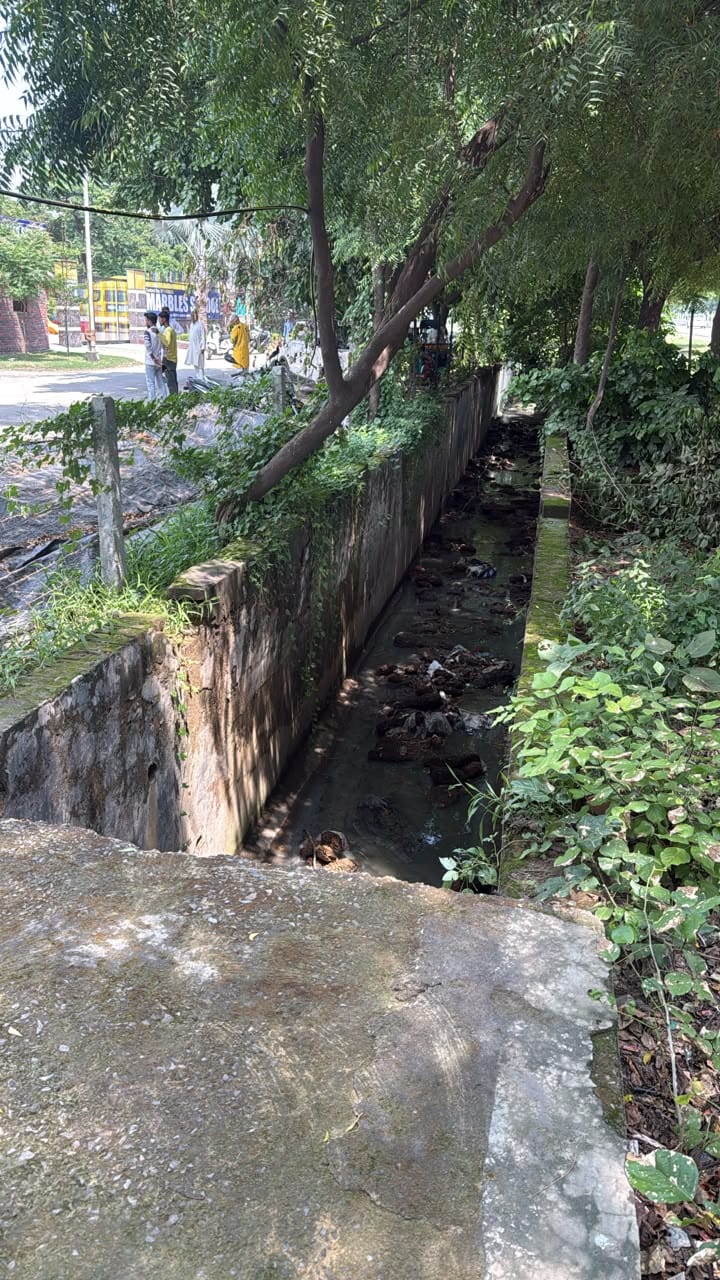 Open drain in front of the school became a problem