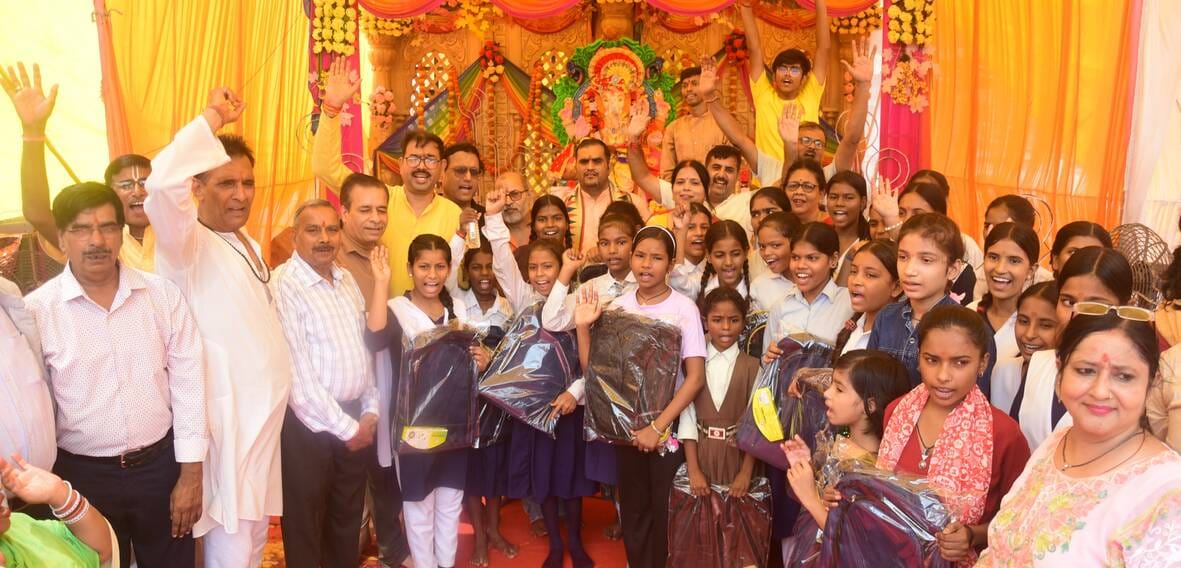 A surging tide of faith at the pandals.