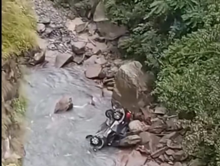 Car of teacher returning from census duty falls into river