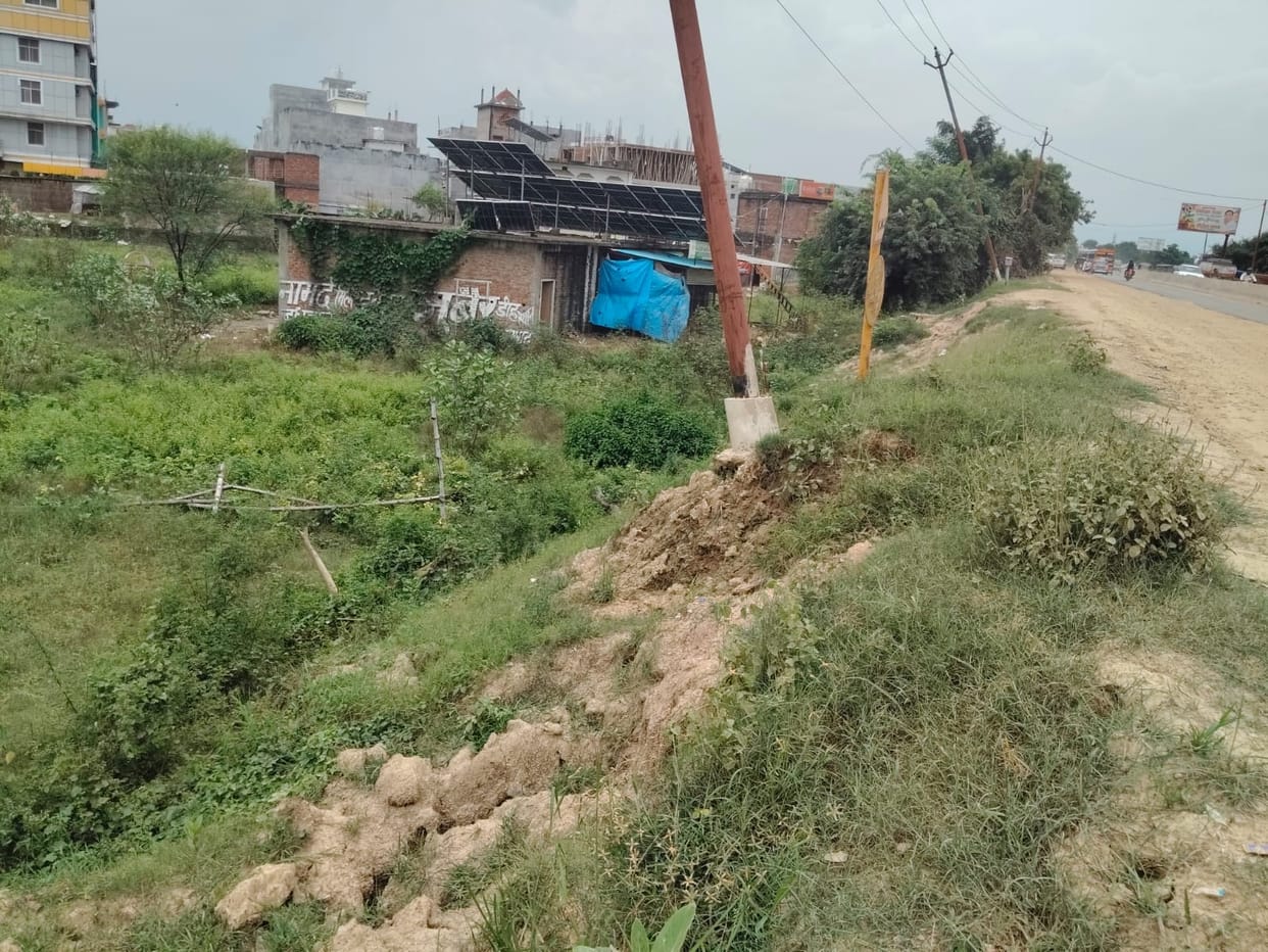 12 poles installed by the municipal corporation have tilted; soil beneath the foundations of several has also washed away.