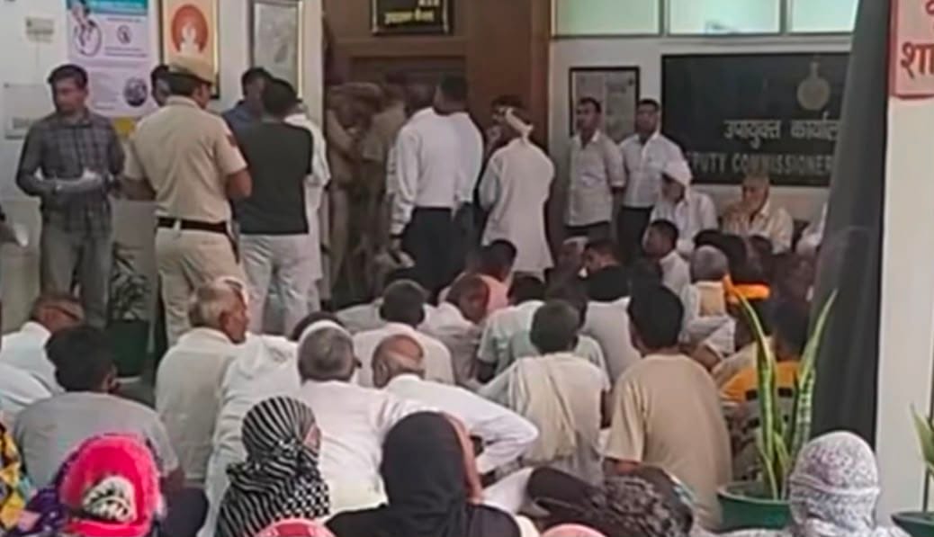 Villagers met the DC in support of the Sarpanch.