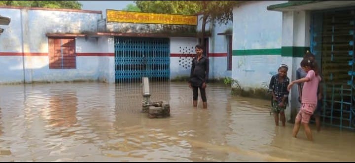 The school in Baba's hut, submerged during the rains.