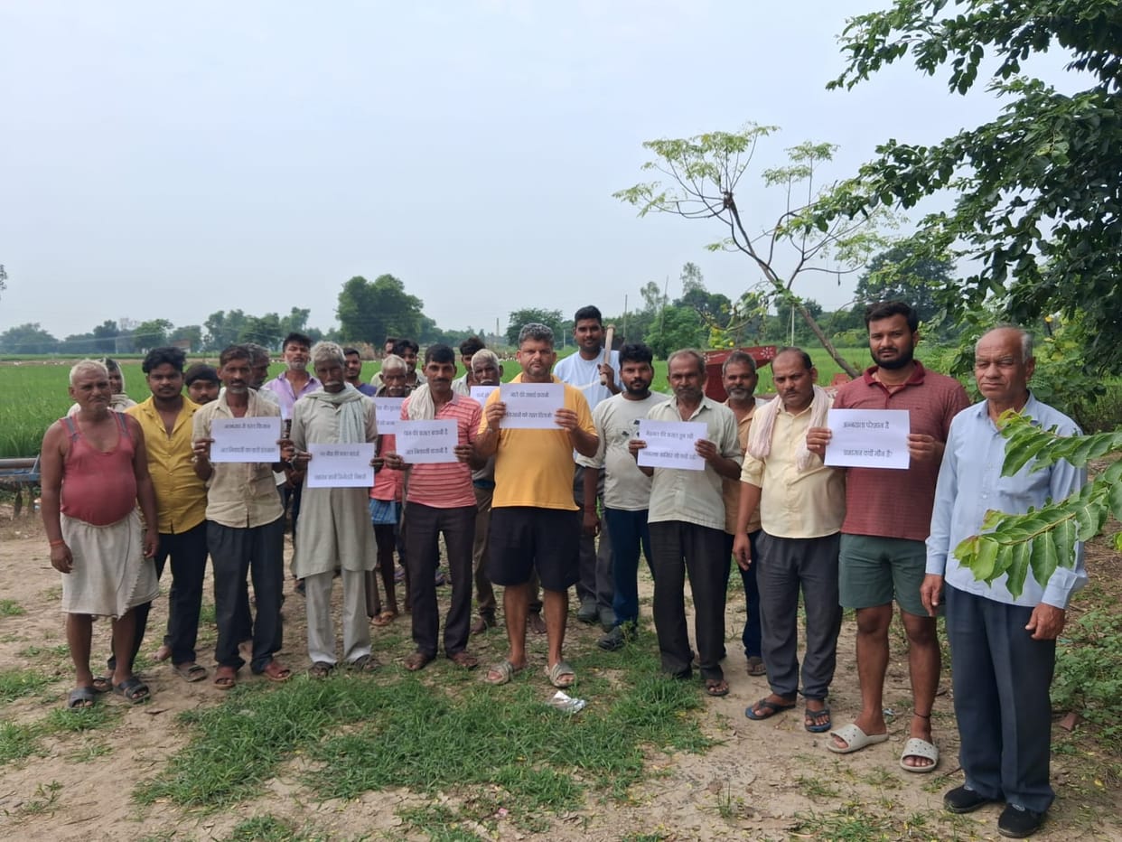 500 bighas of paddy submerged due to drain overflow.