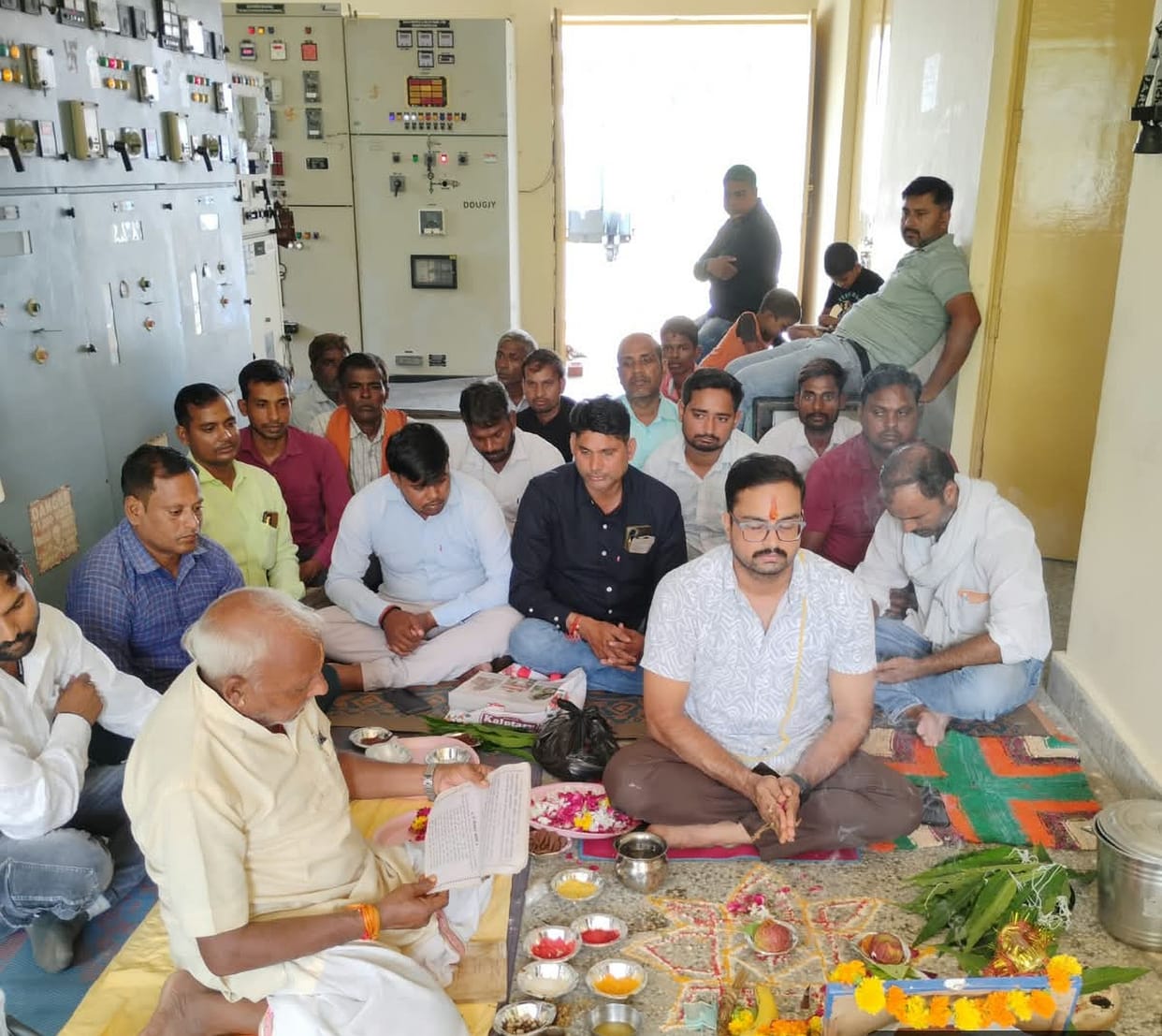 Praying to Lord Vishwakarma for happiness and prosperity.