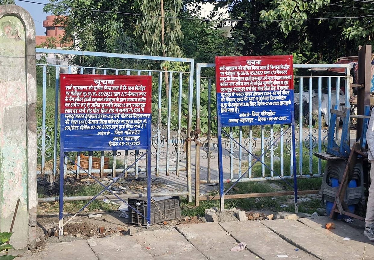 Board at attached properties damaged; police reinstall them.