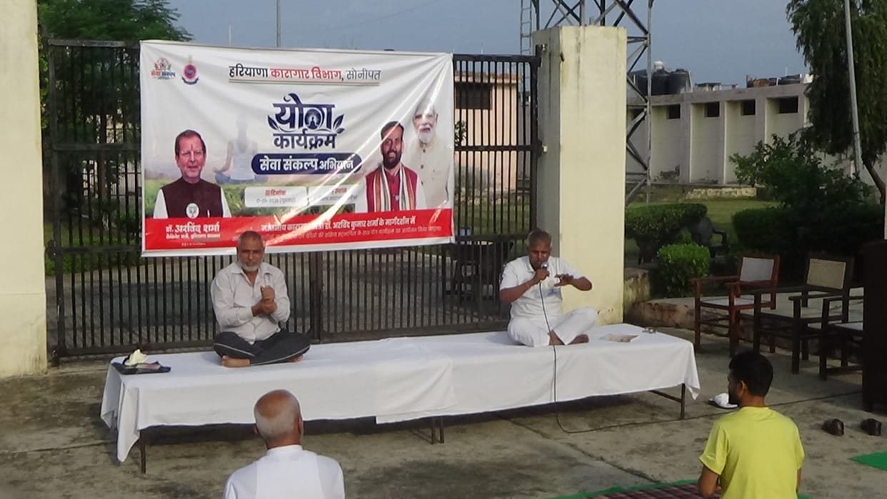 'Blessing lamps' lit after yoga session at the district jail.