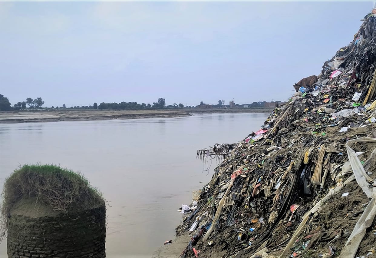 Piles of garbage on the ghats... dirty drain water flowing into the rivers.