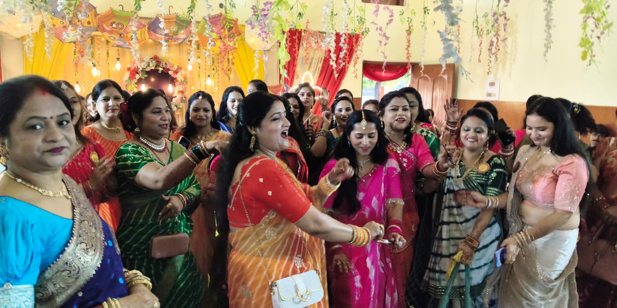 Women danced to folk songs at the Teej festival.