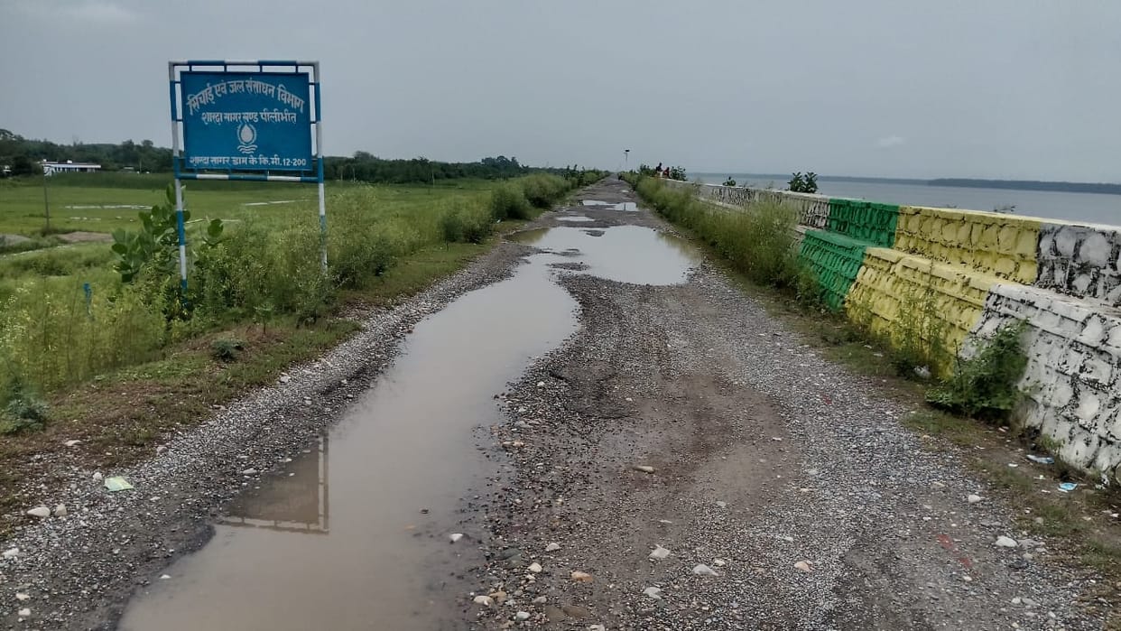 Main road at Sharda Dam riddled with potholes; journey is a painful ordeal.