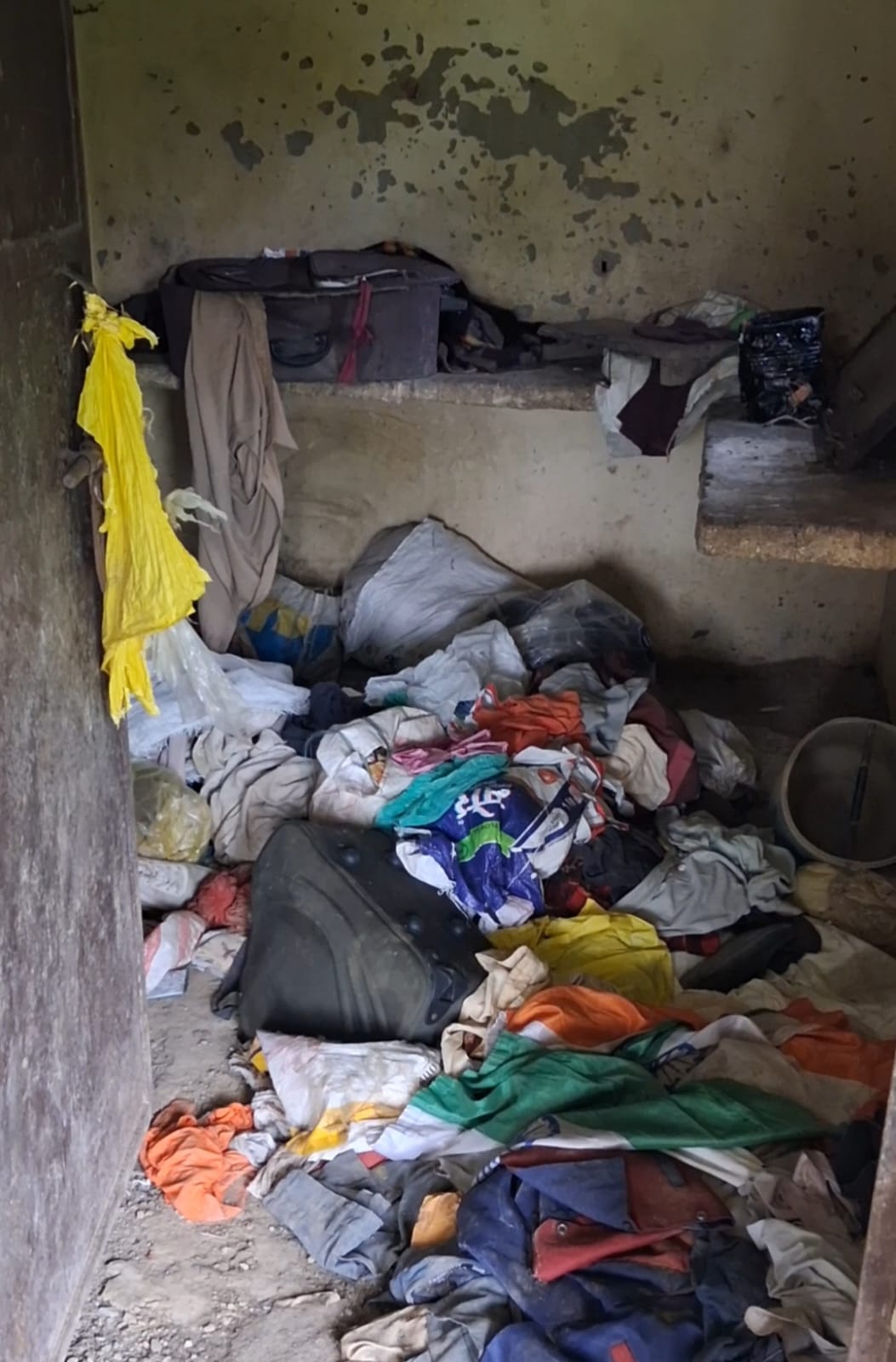 The Anganwadi center's room is filled with junk.