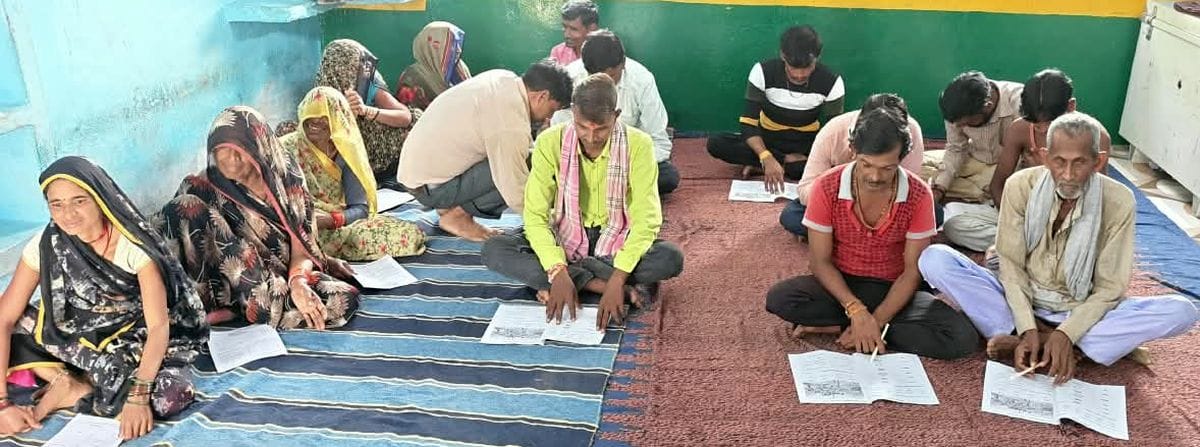 Defying the odds... the elderly put pen to paper; grandparents arrived to take the exam leaning on their walking sticks.