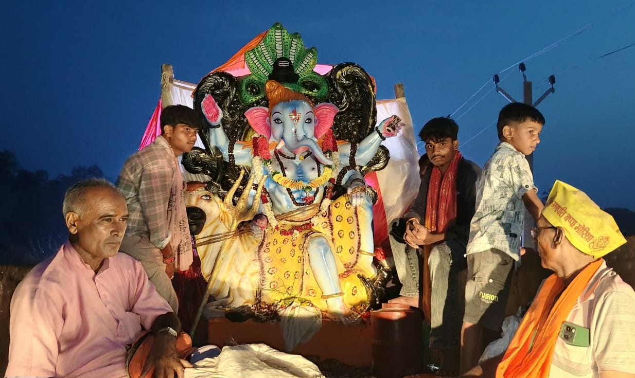 The ghats echoed with chants of "Ganpati Bappa Morya..."